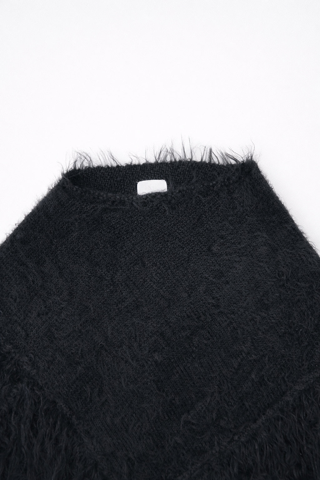 Black fuzzy knit poncho ribbed neckline detail cotton viscose