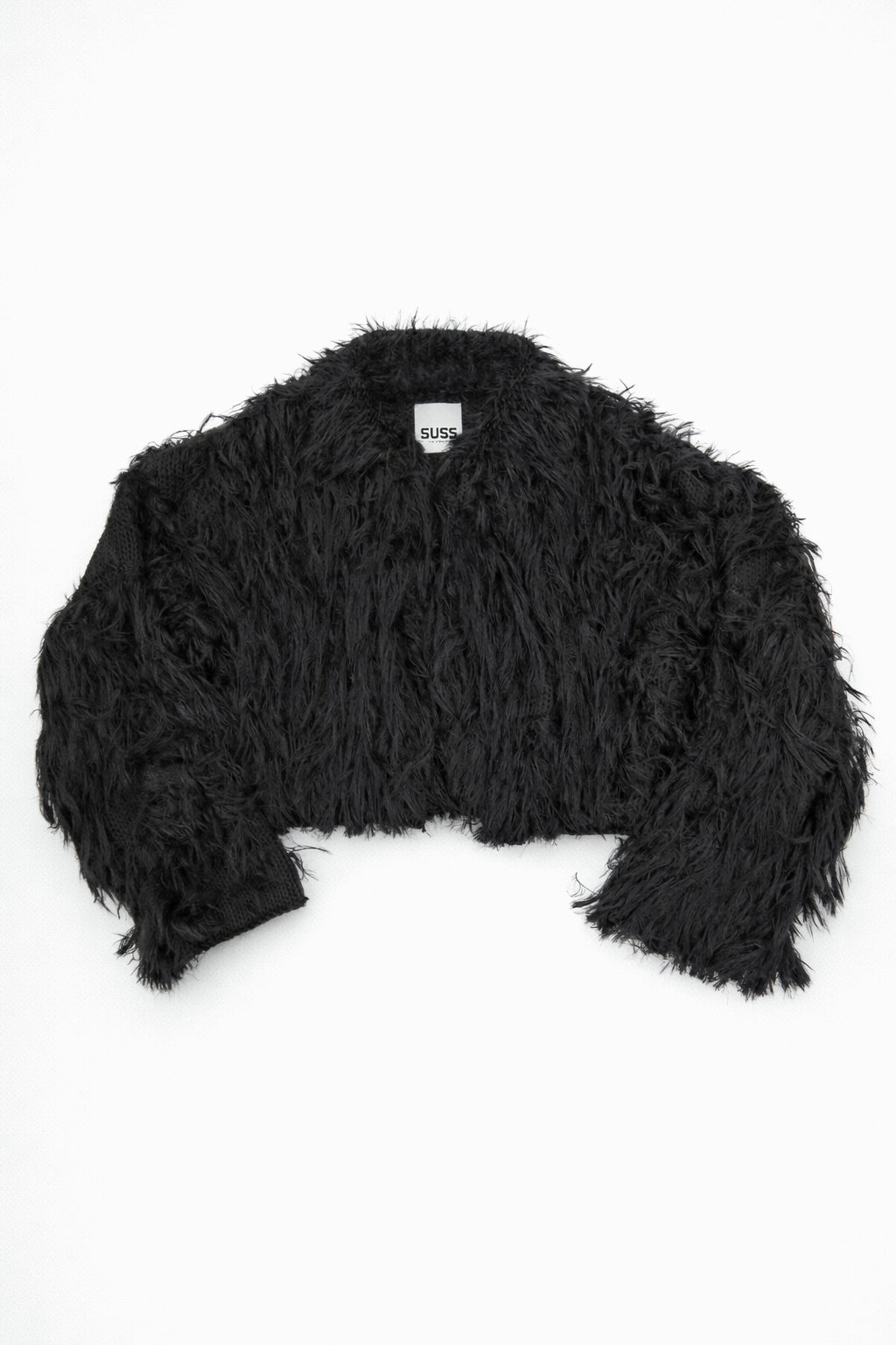 Black hand loomed cropped jacket with long viscose fringe in a textured knit construction