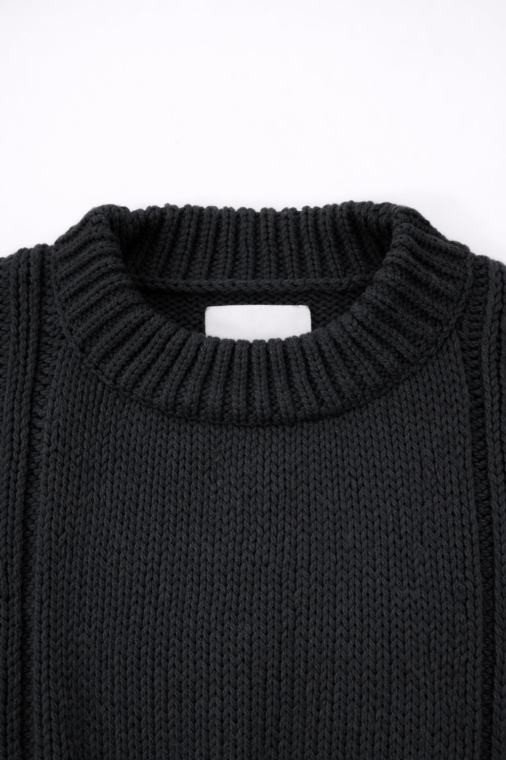 Ribbed crewneck detail on soft chunky black cotton wool blend sweater