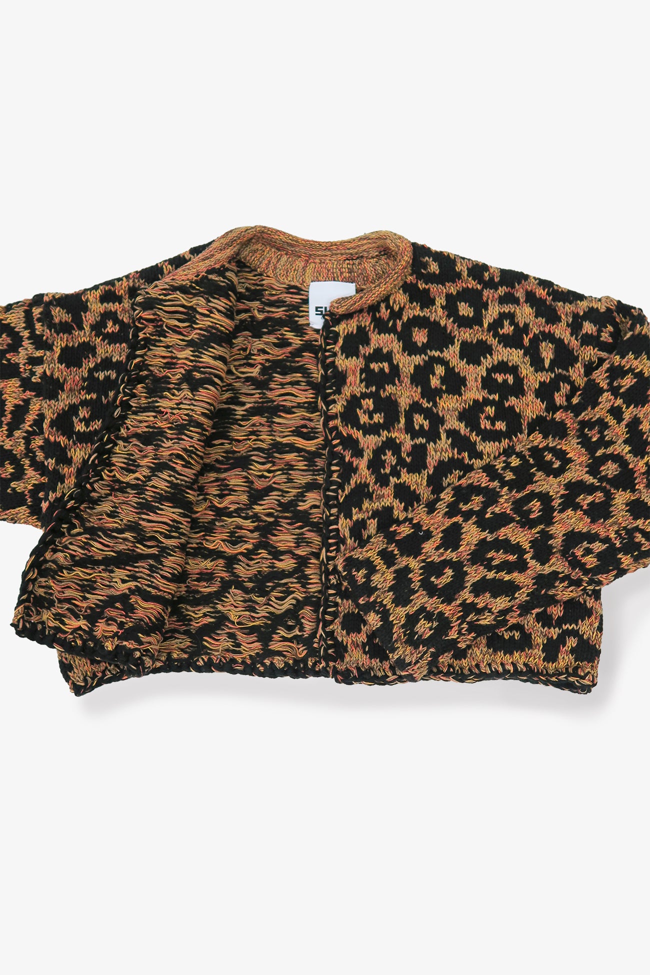 Interior view of leopard knit cardigan showing multicolor tweedy yarn texture