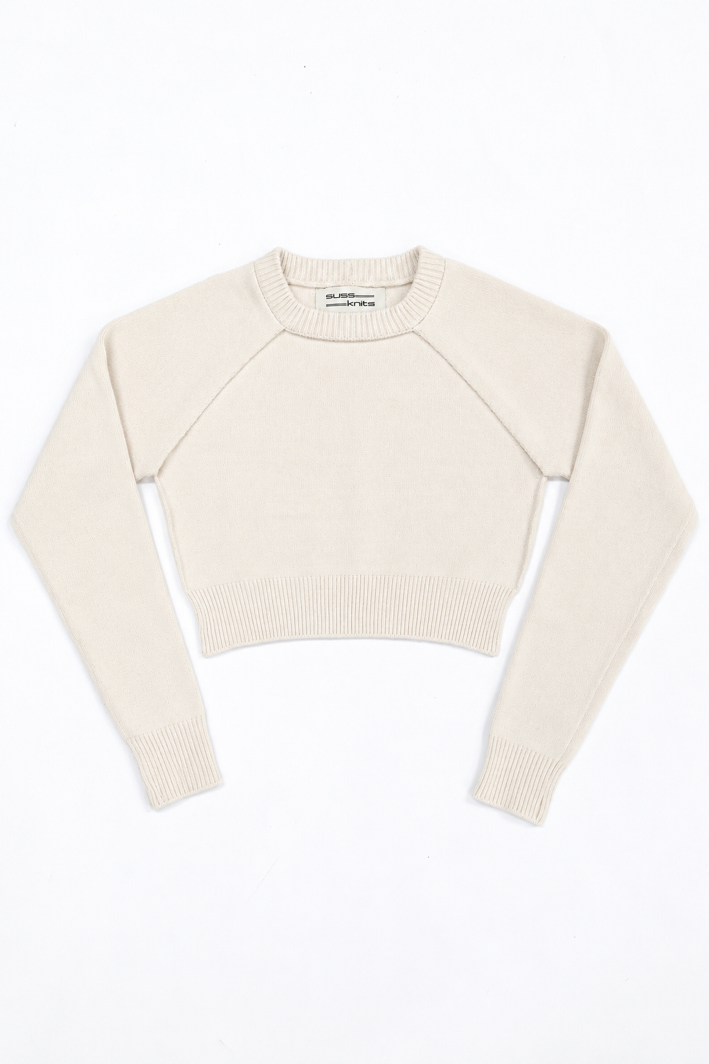 The Suss Knits Cream Open Raglan Knit Top in recycled cotton and lycra, front flat lay