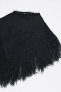 Black fuzzy cotton viscose knit poncho texture detail at angle shape