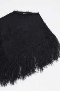 Black fuzzy cotton viscose knit poncho texture detail at angle shape