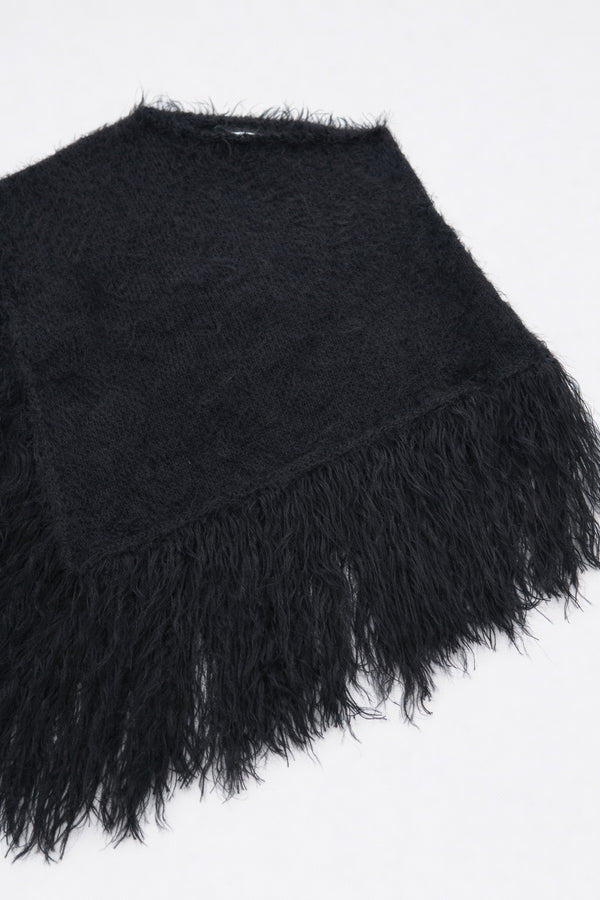 Black fuzzy cotton viscose knit poncho texture detail at angle shape