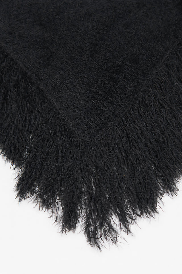 Black fuzzy knit poncho fringe detail cotton viscose texture