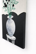 right bottom angled view of mixed media textile wall art combining knit, embroidery, and painting
