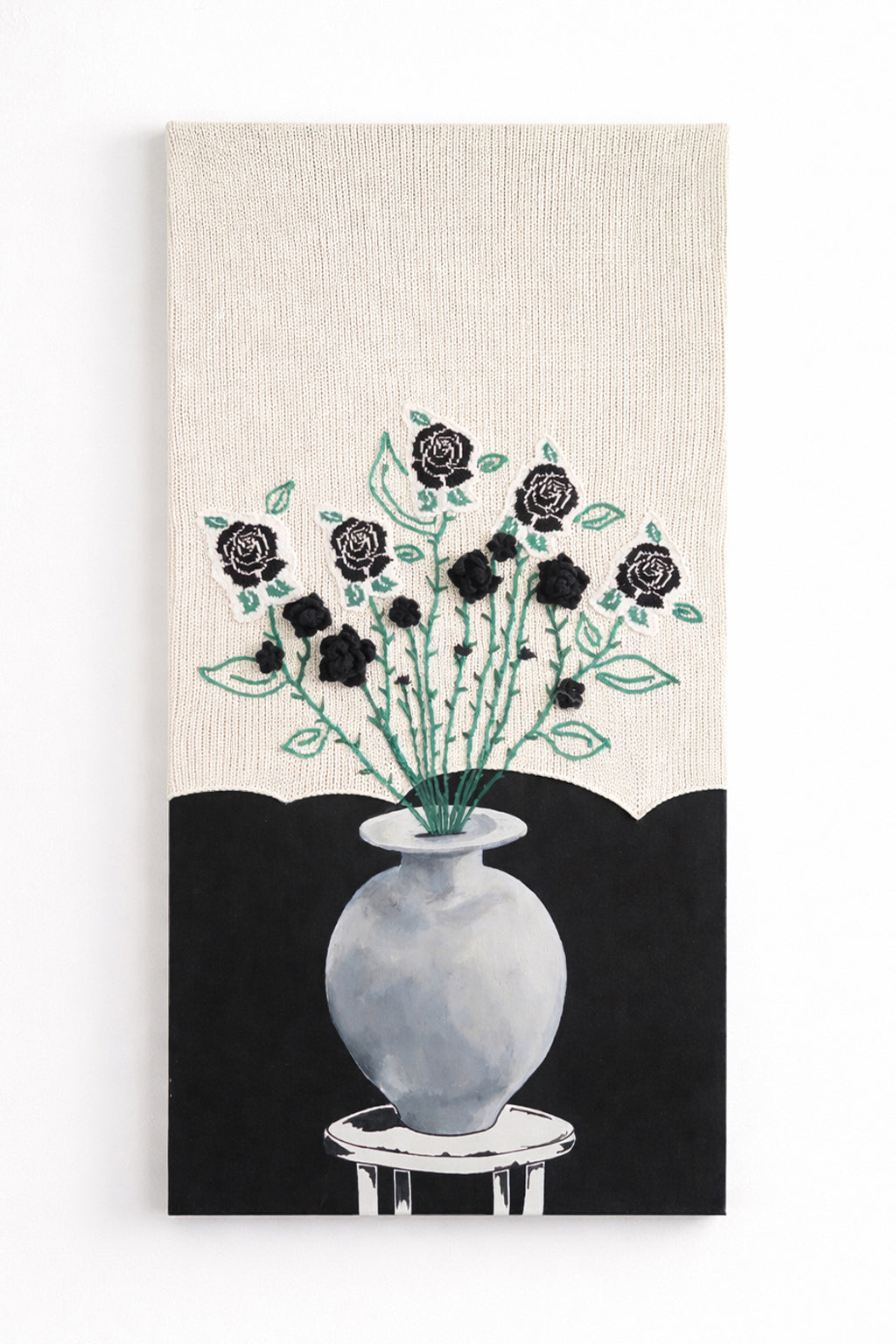 Suss Knits black rose textile wall art with hand loomed cotton knit panel, crocheted roses, and painted still life vase, 24x48 inches