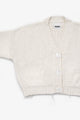 View of the armhole shape detail on the suss knits recycled cotton cream cardigan