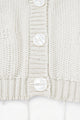 Close up of knit texture view of the Suss Knits cream cardigan knit in recycled cotton