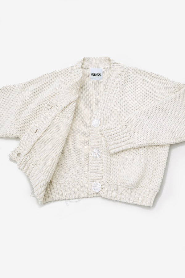 Textured Suss Knits cardigan hand loomed in cream recycled cotton with an open front view