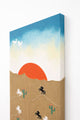 angled view of hand loomed textile wall art with desert sunset and embroidered horses