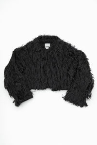 Black hand loomed cropped jacket with long viscose fringe in a textured knit construction