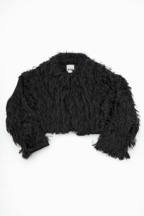 Black hand loomed cropped jacket with long viscose fringe in a textured knit construction