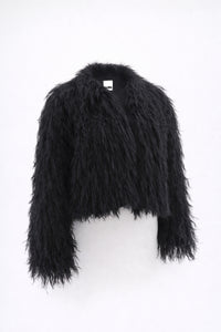 Cropped black fringe jacket shown on form, featuring hand loomed cotton knit base with long shaggy fringe