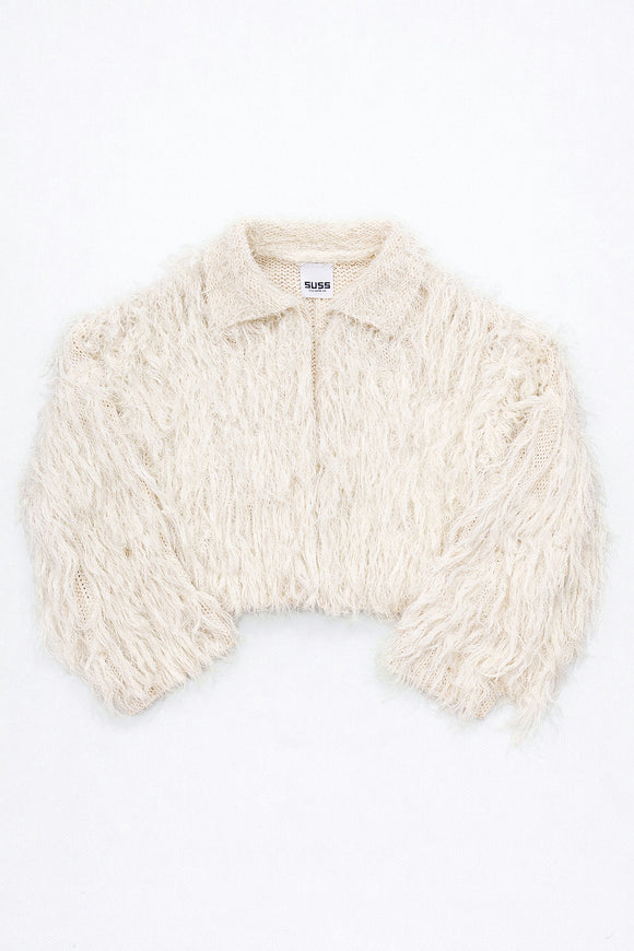 Cream hand loomed cropped cotton jacket with long viscose fringe knit in a textured knit construction