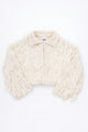 Cream hand loomed cropped cotton jacket with long viscose fringe knit in a textured knit construction
