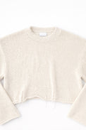 Detail front flat lay of cream cotton light weight knit crewneck sweater by Suss Knits