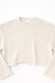 Detail front flat lay of cream cotton light weight knit crewneck sweater by Suss Knits