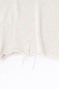 Raw edge hem detail of cream cotton light weight knit sweater by Suss Knits