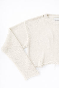 Sleeve texture detail of cream cotton light weight knit sweater by Suss Knits