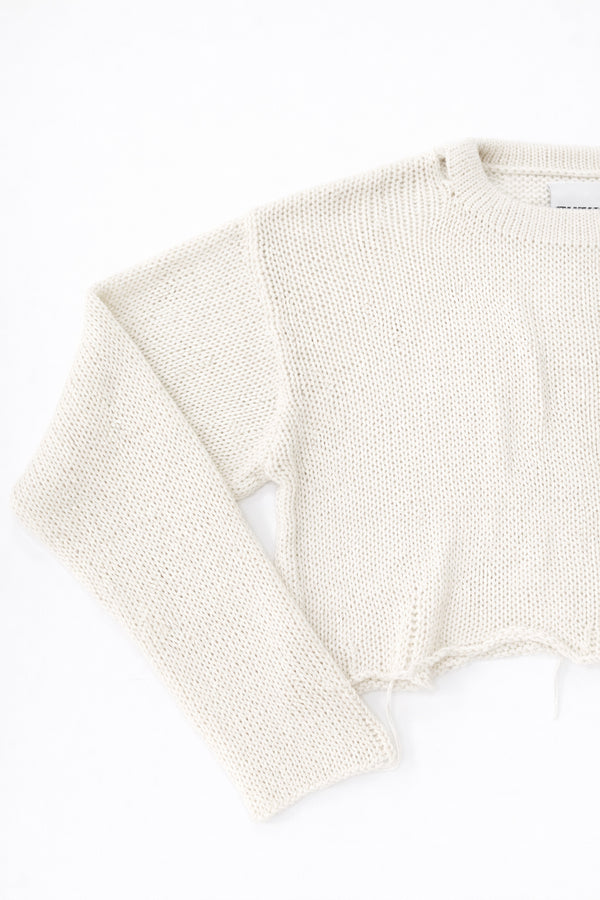 Sleeve texture detail of cream cotton light weight knit sweater by Suss Knits