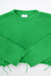 Suss knits green crewneck sweater hand loomed in a cotton wool blend and cropped with distressing