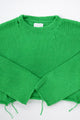 Suss knits green crewneck sweater hand loomed in a cotton wool blend and cropped with distressing