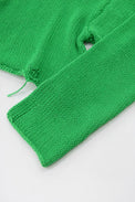Sleeve detail of the suss light weight cropped sweater hand loomed in a cotton wool blend in green