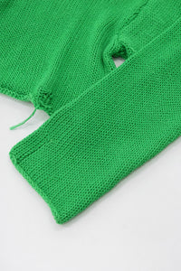 Sleeve detail of the suss light weight cropped sweater hand loomed in a cotton wool blend in green