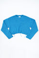 Soft cotton cropped crewneck sweater flat lay hand loomed in turquoise yarn in a light weight knit by Suss Knits