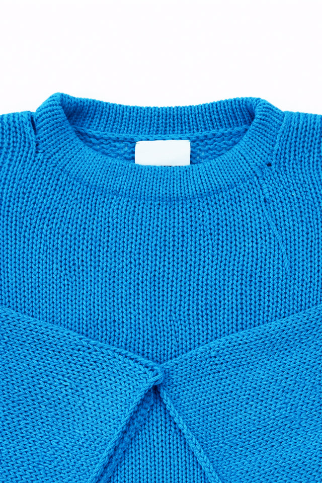 Neckline detail of cotton hand loomed lightweight turquoise sweater
