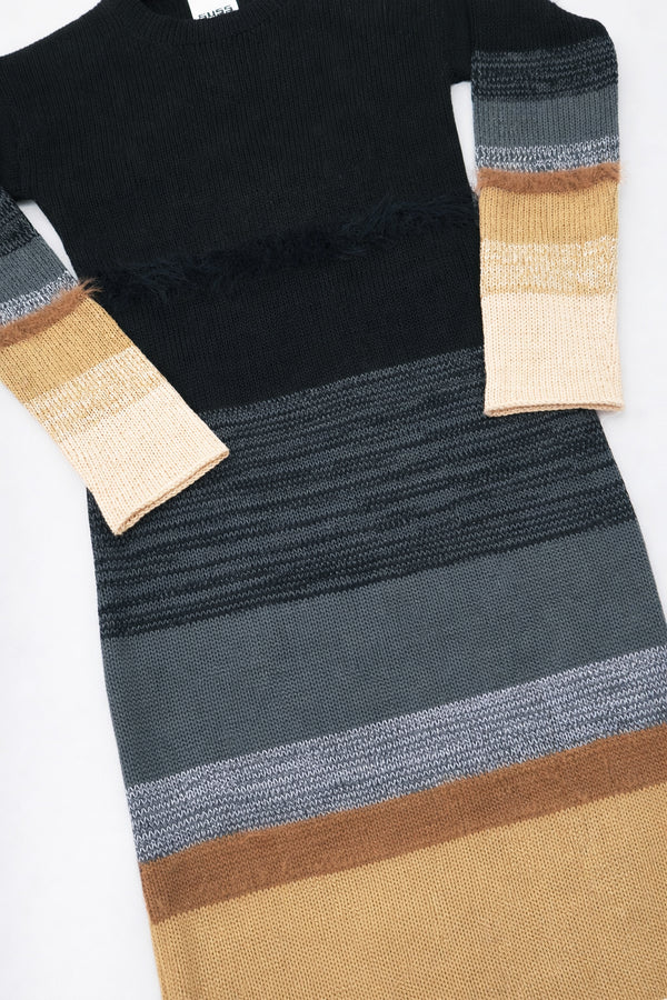 Close-up of Suss knit dress highlighting gray variegated knit texture and color transitions