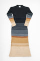 Suss knit cotton sweater dress with variegated stripe pattern in neutral tones shown flat on light gray background