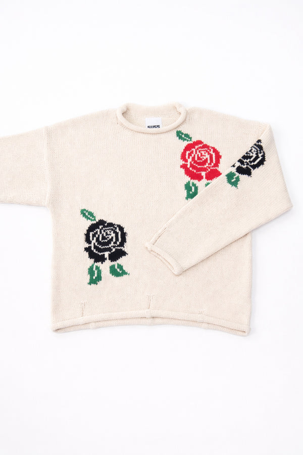 Front flat lay detail of the Suss cream recycled cotton hand loomed sweater emphasizing the armhole.