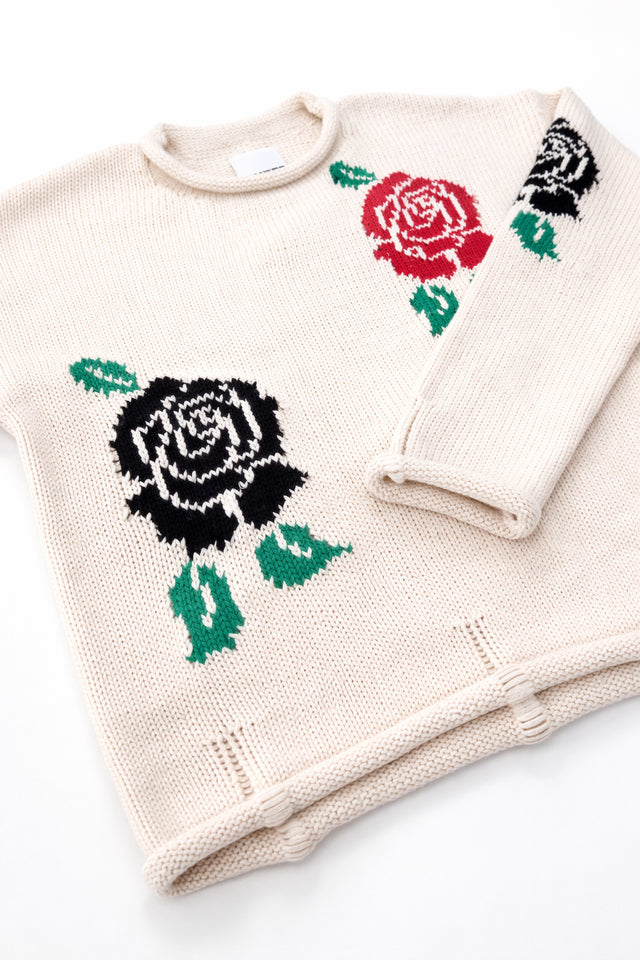 Hem detail with drop stitches of the Suss rose rollneck sweater hand loomed in recycled cotton
