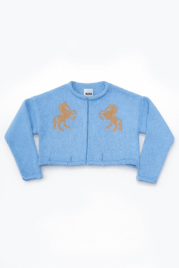 Baby blue cotton cropped knit jacket with tan horse design by Suss Knits front view