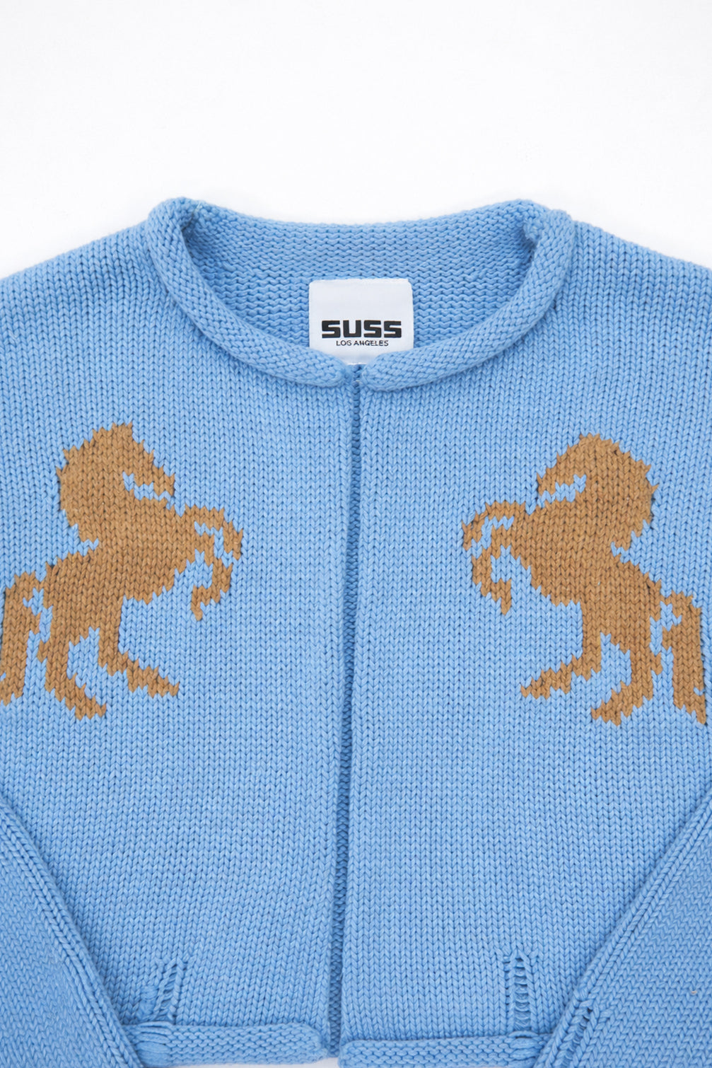 Baby blue cotton knit horse jacket detail with Suss Los Angeles label
