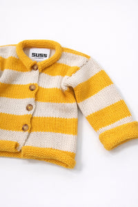 Angled view of cotton yellow striped baby knit cardigan showing texture detail