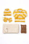 Yellow and cream cotton striped baby knit gift set flat lay with cardigan, blanket, beanie and booties flat lay of items