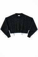 Charcoal black cropped cable knit sweater with distressed hem, chunky hand loomed cotton wool blend knit