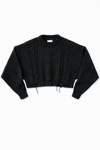Charcoal black cropped cable knit sweater with distressed hem, chunky hand loomed cotton wool blend knit