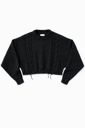 Charcoal black cropped cable knit sweater with distressed hem, chunky hand loomed cotton wool blend knit