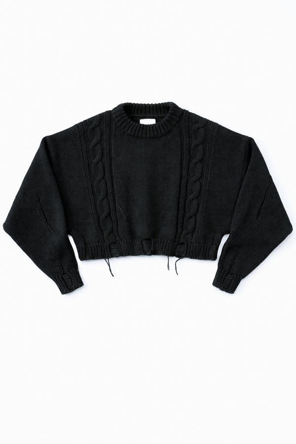 Charcoal black cropped cable knit sweater with distressed hem, chunky hand loomed cotton wool blend knit