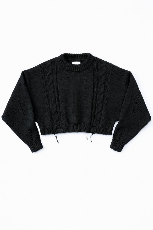Charcoal black cropped cable knit sweater with distressed hem, chunky hand loomed cotton wool blend knit