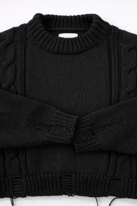 Ribbed crewneck and cuff detail on soft chunky black cotton wool blend sweater