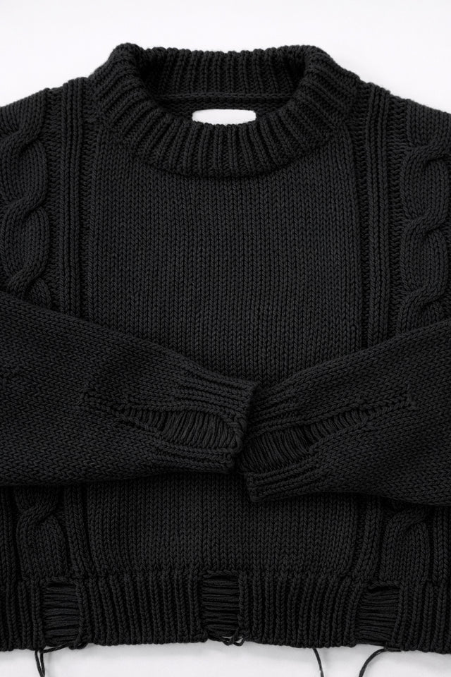 Ribbed crewneck and cuff detail on soft chunky black cotton wool blend sweater
