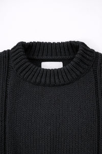 Ribbed crewneck detail on soft chunky black cotton wool blend sweater