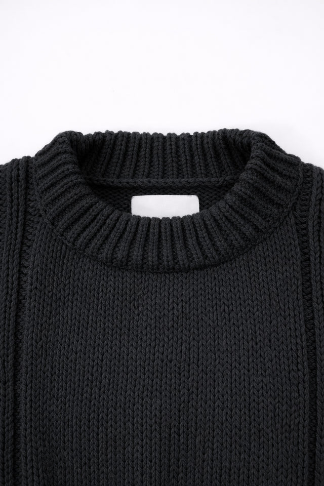 Ribbed crewneck detail on soft chunky black cotton wool blend sweater