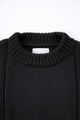 Ribbed crewneck detail on soft chunky black cotton wool blend sweater