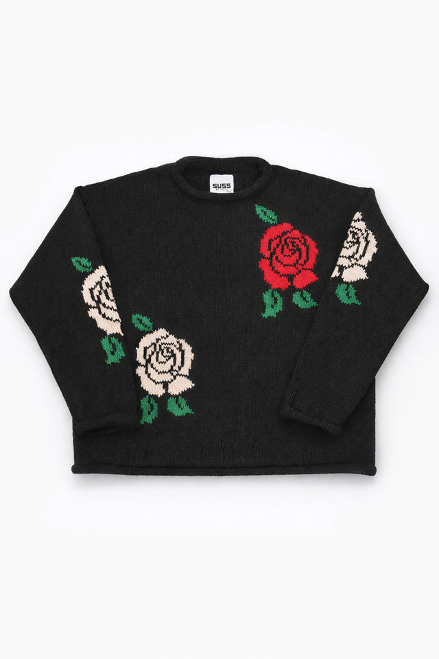 Black cotton knit sweater with red and white rose intarsia design by Suss Knits